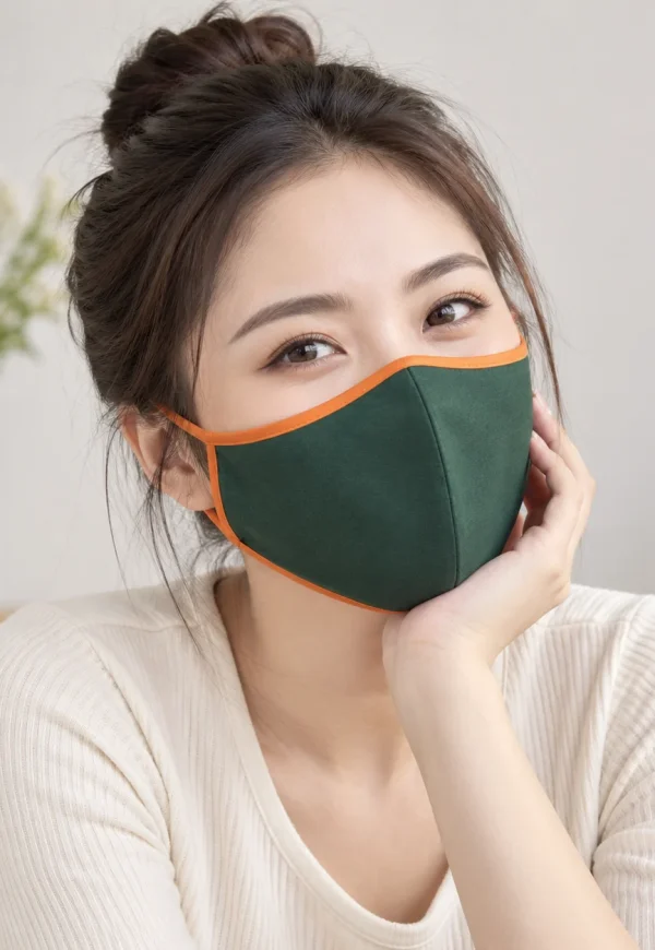 Khẩu trang vải xanh rêu phối viền cam